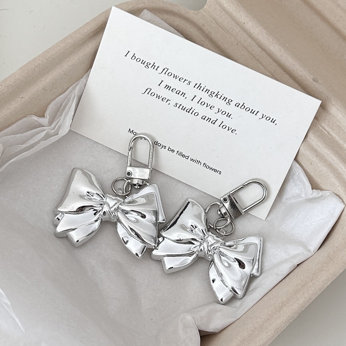 Silver bow keychain
